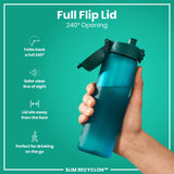 A teal water bottle stands upright against a white background. The bottle has a hinged, textured lid with a push-button closure. The brand 