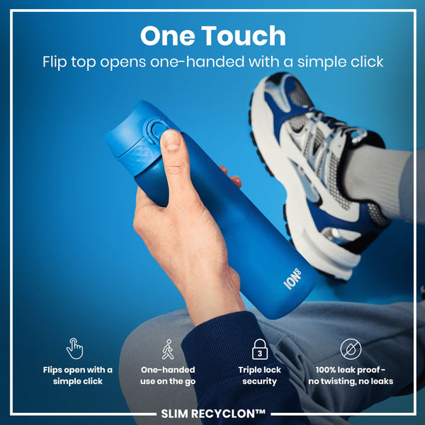A hand holds a blue, cylindrical water bottle; its flip top opens with a single click. The context is a person in athletic clothing against a blue background.