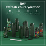 Several dark-green water bottles, some with child-friendly designs, are displayed on a green surface; 