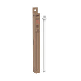A white straw stands upright beside a tall rectangular brown box labeled 