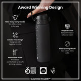 A dark-grey water bottle is being held; it has a handle and straw. The bottle features a wide mouth and hygiene cover. Awards and design details are shown on the accompanying advertisement.