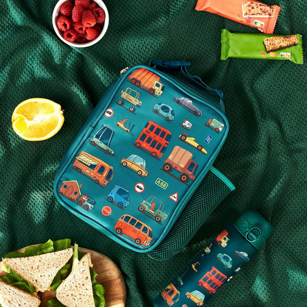 A rectangular teal lunchbox showcases colorful cartoon vehicles including cars, buses, and trucks with road signs such as "Stop" and "A68" in a playful pattern.