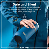A person's hand holds a blue ION8 travel flask with a soft base for silent placement. Text reads: 