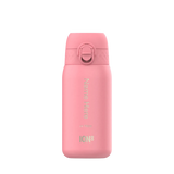A pink insulated water bottle stands upright on a plain background. The bottle shows text 